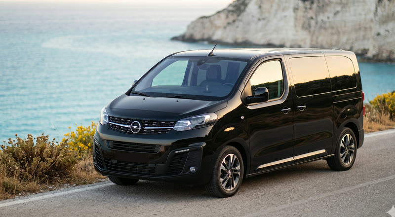 Black Opel Zafira Life 2020 van on a Zakynthos coastal road